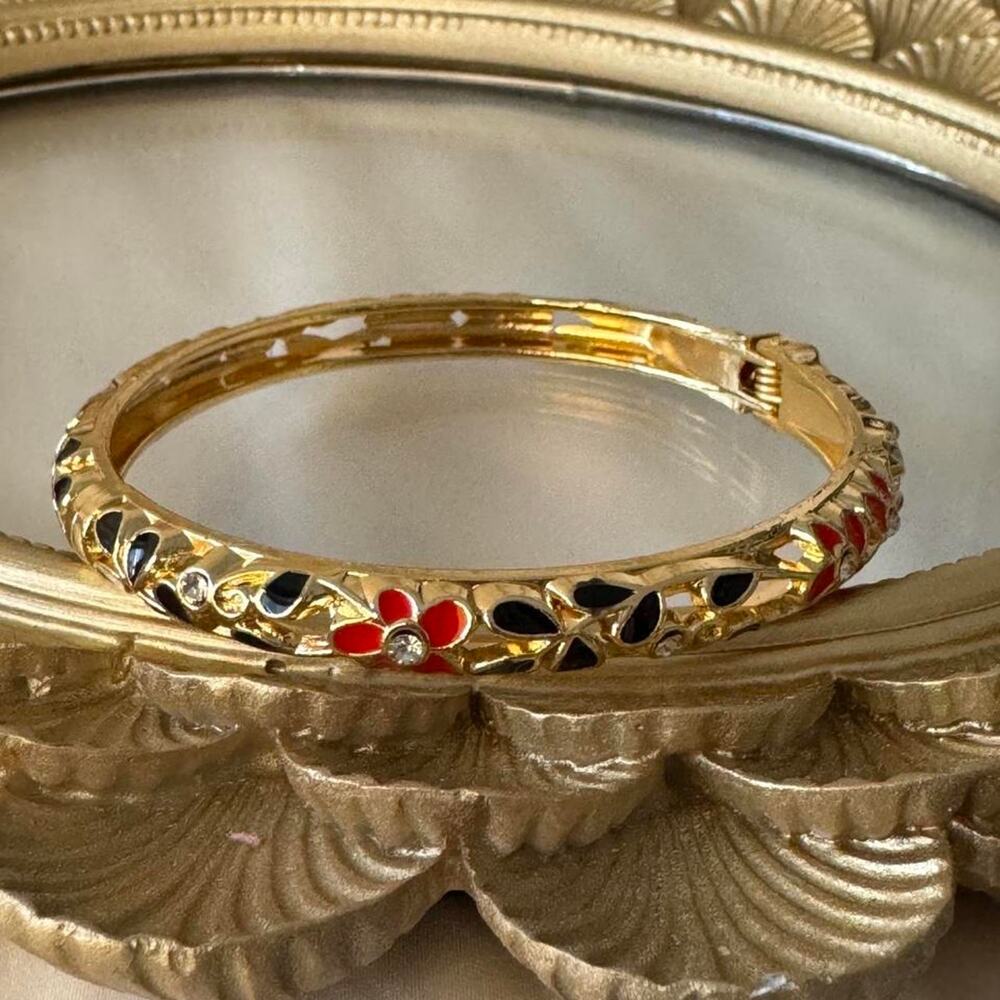 Gold bangle with red floral